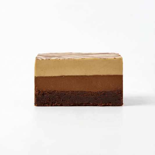 Cacao Pecan raw vegan cake slice with layered chocolate and pecan flavors, a plant-based dessert option.