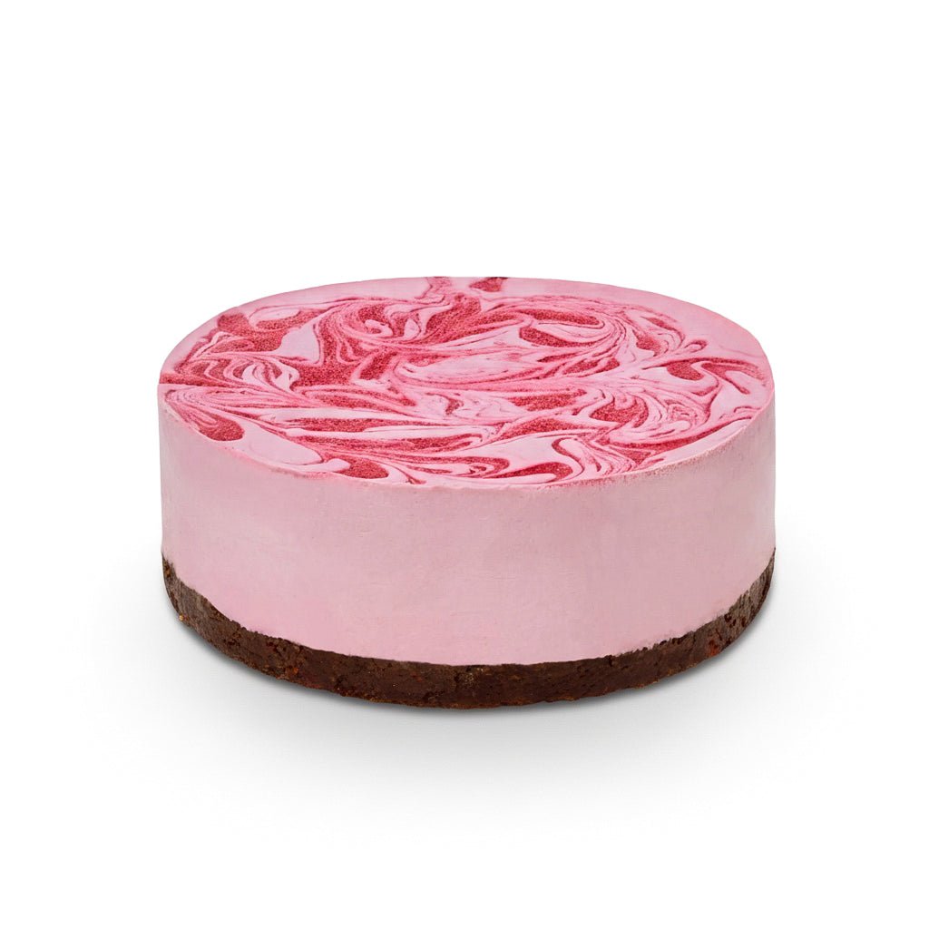 Raspberry Chocolate cake with smooth pink frosting and dark chocolate base, creamy swirled raspberry topping